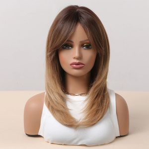 Front view of shoulder-length warm brown to blonde straight synthetic wig with curtain bangs on mannequin